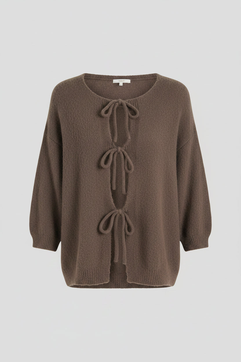 A fuzzy, textured knit sweater in a taupe-brown color, featuring a deep V-neckline with three decorative tie-front closures.