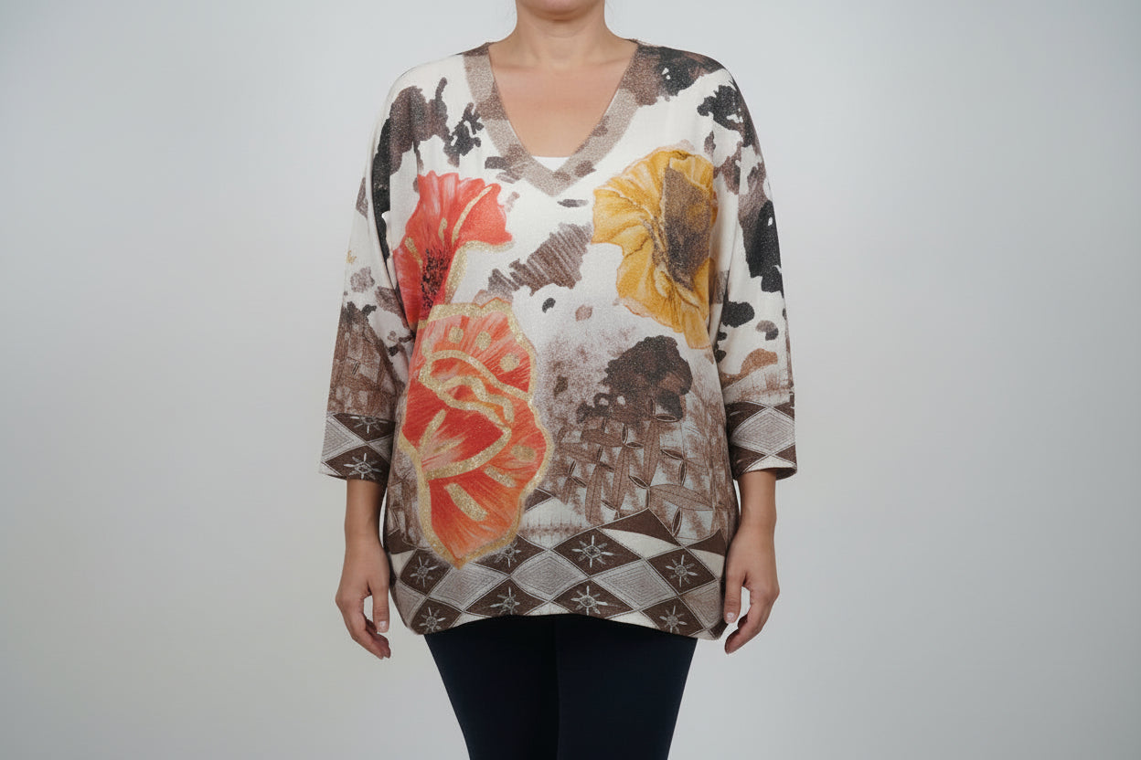 Floral patterned top worn by a person on a plain background