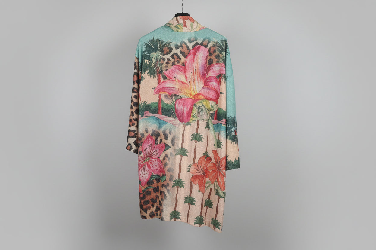 Long-sleeve dress with floral and leopard print design on a gray background