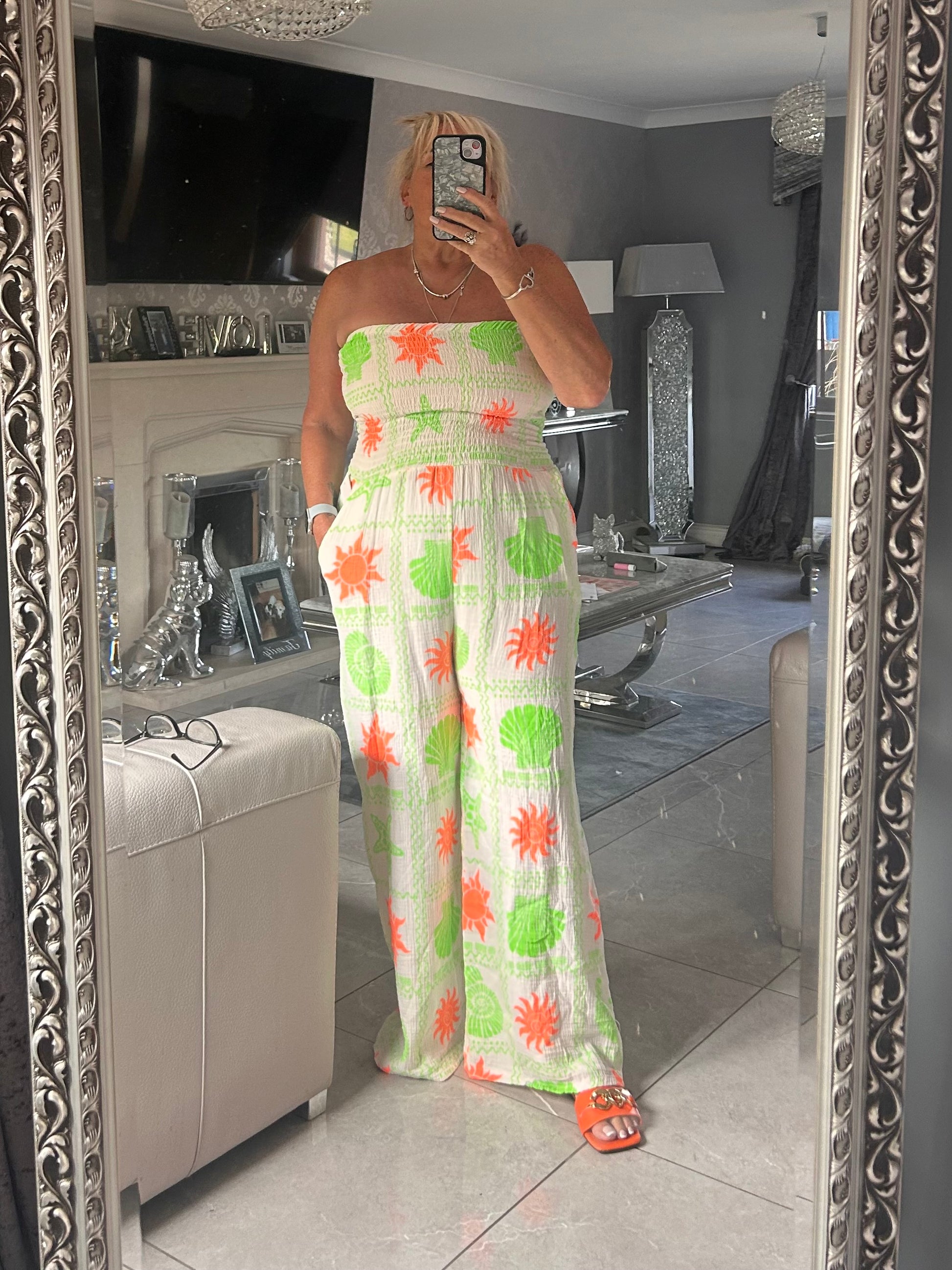 women taking  a selfie wearing a shelly jumpsuit
