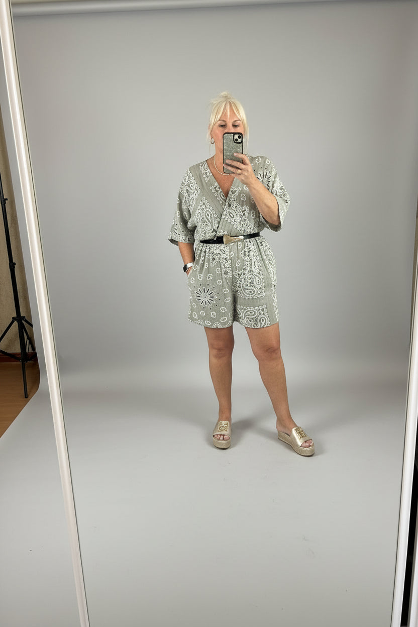 Person taking a selfie in a playsuit