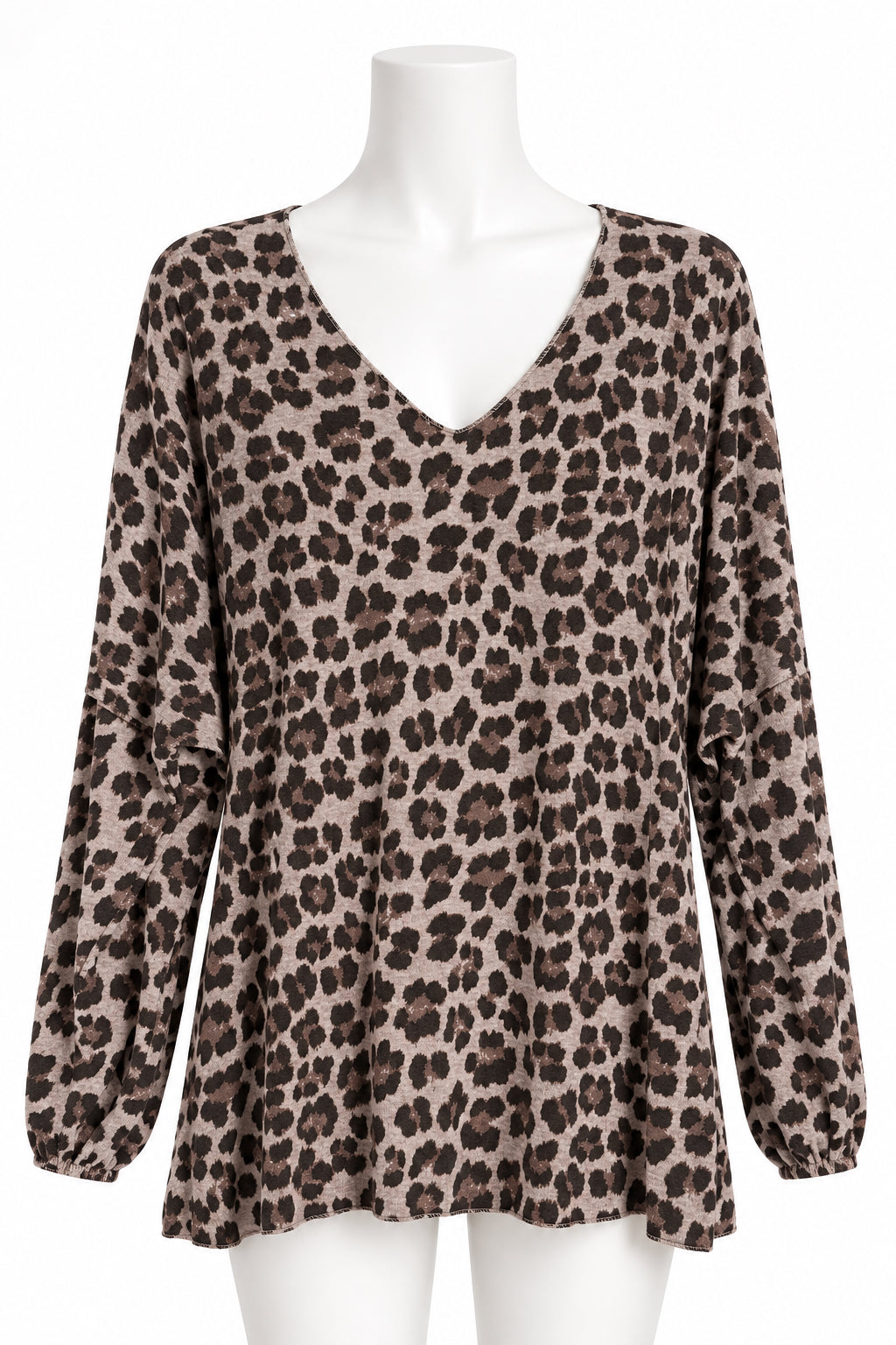 A long-sleeve leopard print top hanging on a black hanger against a white paneled wall. The top features a brown and black animal print over a muted taupe base, with a V-neckline and a small white brand label at the collar.