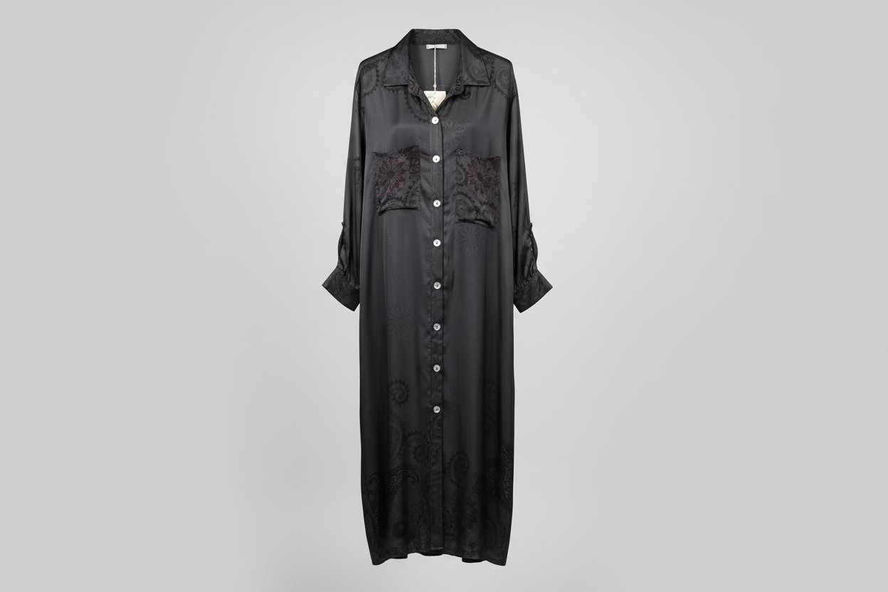 Black button-up dress on a light gray background