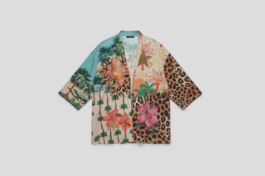 Colorful patterned shirt with floral and leopard print on a light gray background