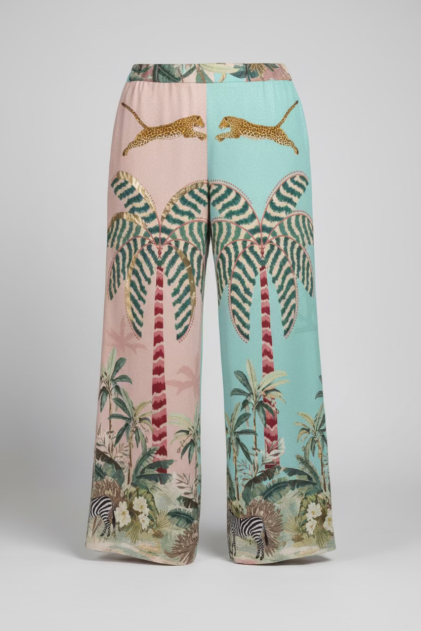 Tropical-themed pants with animal prints on a light gray background