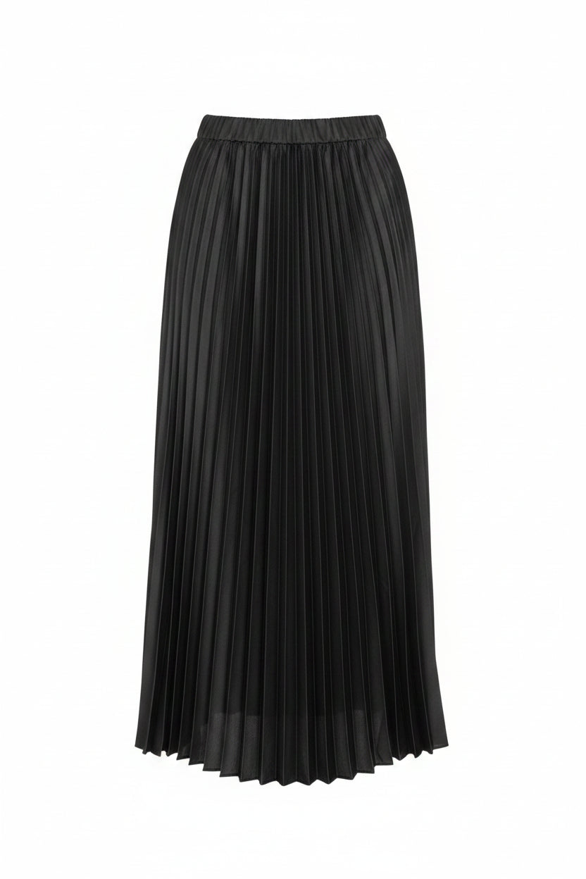 A black pleated midi skirt hanging on a hanger against a cream-colored paneled door.