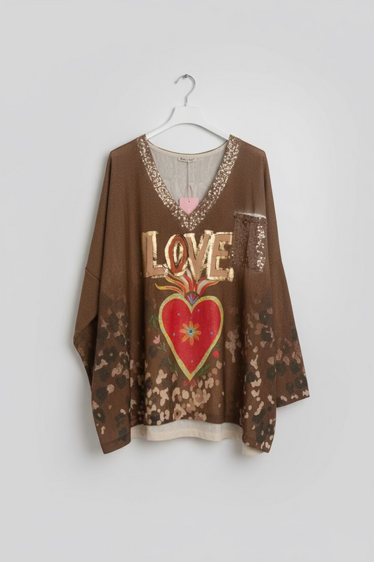 Brown shirt with 'LOVE' and heart design on a hanger against a white background